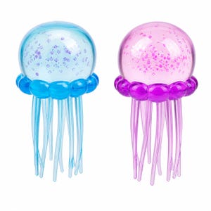 May include: Two decorative jellyfish ornaments. One is blue with blue tentacles and the other is pink with purple tentacles. Both have a clear, round body filled with glitter and a ring of round beads at the base.