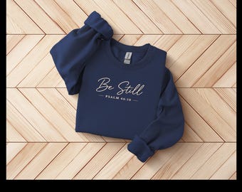 Sudadera «Be Still» (Mantente quieto) Salmo 46:10, cuello redondo, Gildan Heavy Blend