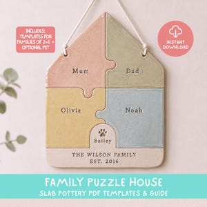 May include: A house-shaped ceramic wall hanging composed of five interlocking puzzle pieces in pastel pink, green, yellow, and blue. The pieces are stamped with the names Mum, Dad, Olivia, Noah, and Bailey with a paw print. Text reads THE WILSON FAMILY EST. 2016.