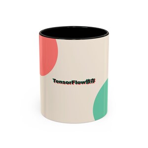 May include: A two-tone coffee mug with a black interior and a beige exterior. The mug features a red circle on the left side and a green circle on the right side. The text "TensorFlow保存" is printed in the centre of the mug.