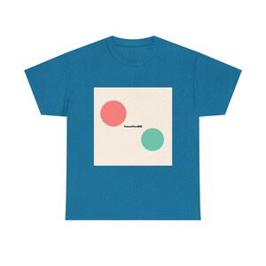 May include: A teal t-shirt with a square graphic. The graphic has a coral circle and a teal circle on a cream background. The text "TensorFlow88" is printed below the circles. The shirt is made of a soft, comfortable material.