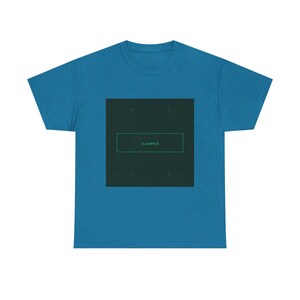 May include: A teal-colored t-shirt featuring a dark green square graphic. Inside the square is a green rectangle with Japanese text. The t-shirt is made of a soft material and has short sleeves.