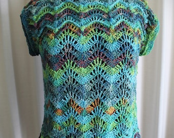 May include: A crocheted top with a wavy, scalloped design in shades of green, blue, and brown.