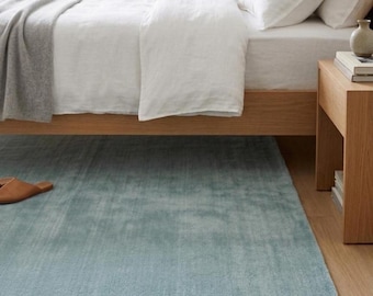 Alfombra de lana tejida a mano, color azul claro, 7x10 pies, ideal para sala de estar o decoración del hogar.