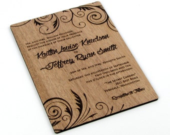 May include: A wooden wedding invitation with a floral design. The invitation reads "MR. AND MRS. WILLIAM KNUDSON REQUEST THE HONOR OF YOUR PRESENCE AT THE MARRIAGE OF THEIR DAUGHTER Kaitton Louise Knudson TO Jeffrey Ryan Smith SON OF MR. AND MRS. KENNETH SMITH SATURDAY, THE EIGHTEENTH OF SEPTEMBER TWO THOUSAND AND TEN FIVE O'CLOCK IN THE AFTERNOON "THE SECRET GARDEN" 2621 BEST ROAD VERADALE, WASHINGTON Reception to Follow"