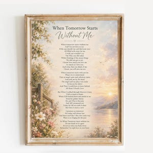 May include: A framed wall art print featuring the poem When Tomorrow Starts Without Me. The background displays a serene landscape with a sunset over a lake, mountains, and a foreground of wildflowers and a wooden fence in soft pastel colours.