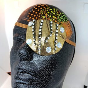 Handmade "Rapunzel" Eye Patch: Gold Metallic Fabric, Feather  Gemstones. creatively designed proSEOhq