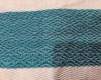 Bufanda 100% algodón, gruesa y cálida para un uso confortable.