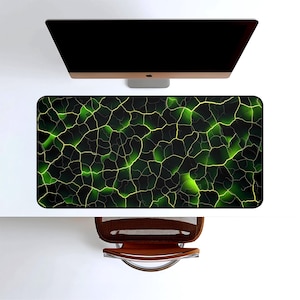 May include: A set of three ceramic mugs with a speckled, matte finish. The mugs are in shades of cream, light gray, and dark gray. Each mug has a simple, minimalist design and a rounded handle. Perfect for coffee or tea.