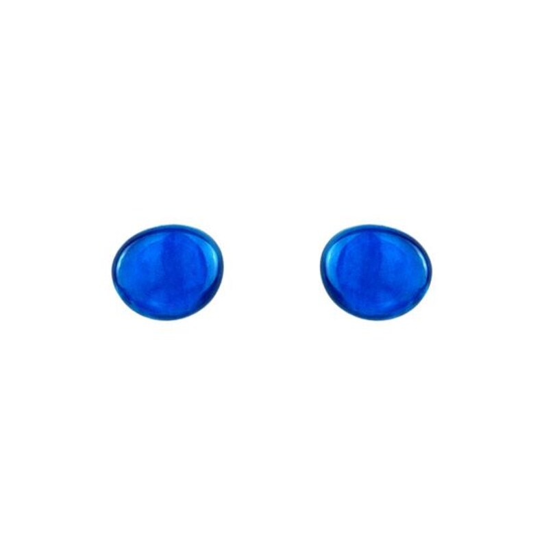 Close‑up of natural Capiz shell surface on 12mm studs