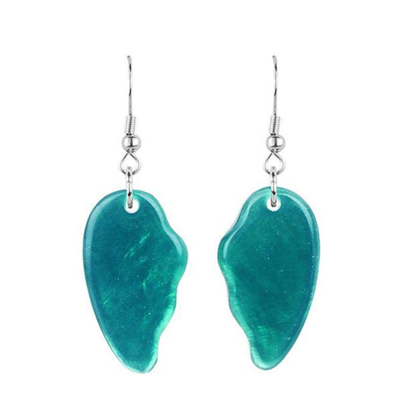 May include: A pair of teal-colored earrings with a heart-shaped design. The earrings have a silver-colored hook and are made of a translucent material. The earrings are displayed against a white background.