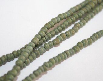 2-3mm Coconutshell Pucalet Rondelle 38cm strand, hole approx. 0.5mm, natural coconut beads, natural beads bio coco beads