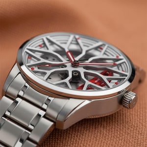Men s Stainless Steel Wristwatch with Skeleton Dial and Red Accents for Sporty Elegance