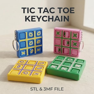 May include: Four square tic tac toe game boards, two with metal keychains attached. One blue board with yellow grid and O marks, one pink board with green grid and X marks, one yellow board with purple grid and O marks, and one green board with white X marks.