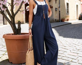 Mono azul marino de pierna ancha, sin mangas, estilo bohemio veraniego con bolsillos.