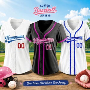 May include: Three button-down baseball jerseys in white, black, and white pinstripe. Each features the text Teamname and the number 00. The black jersey has pink trim, while the white jerseys have blue accents. A pink helmet and baseball are included.