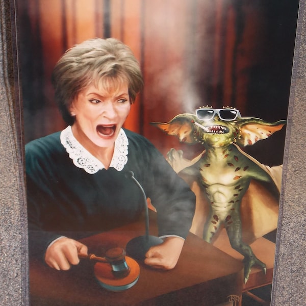 Gremlins Flasher vs Judge Judy Glossy Art Print 11 x 17 In Hard Plastic Sleeve