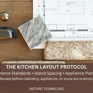 May include: A collection of kitchen design elements on a wooden surface. Includes a brass knob, a cup pull, a marble tile, a brick sample, and a kitchen layout blueprint. Text reads "THE KITCHEN LAYOUT PROTOCOL" and details about kitchen design.