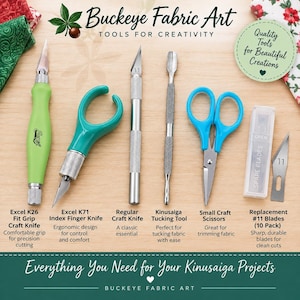May include: A set of crafting tools including a lime green Excel K26 fit grip craft knife, a teal Excel K71 index finger knife, a silver craft knife, a silver Kinusaiga tucking tool, blue craft scissors, and a pack of 10 replacement #11 blades.