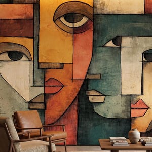 May include: Abstract wall art featuring three stylized faces in a cubist style. The artwork uses a palette of warm colors like orange, yellow, and red, contrasted with cool tones of green and blue. The faces are composed of geometric shapes.