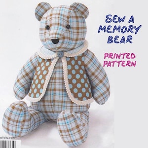 May include: A plaid fabric memory bear with a blue and brown plaid pattern and a blue polka dot waistcoat. The bear is sitting with its legs crossed. The text "Sew a Memory Bear Printed Pattern" is in the top right corner of the image.