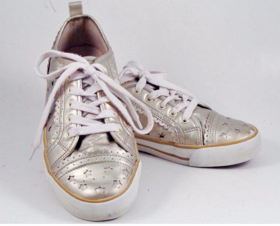gold athletic shoes