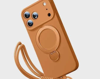 Pode incluir: Capa de telefone castanha com um suporte de anel e um cordão a condizer. A capa tem um acabamento liso e uma saliência para a câmara com três lentes. O cordão é feito de corda trançada e prende-se à capa com um anel de metal.