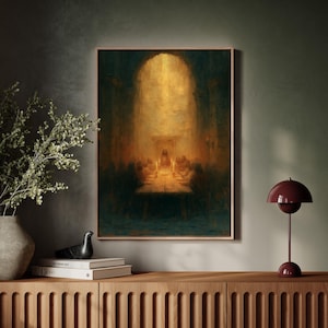 May include: A framed vertical wall art print depicting a dimly lit, atmospheric scene of a group of figures seated around a long table in a dark, cavernous hall, illuminated by a warm, golden light emanating from the center of the composition.