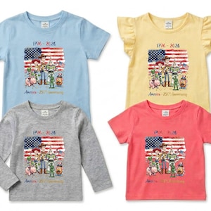 May include: Four children's t-shirts in light blue, yellow, gray, and coral. Each shirt features a graphic of the American flag and cartoon characters with the text "1776-2026" and "America - 250th Anniversary".