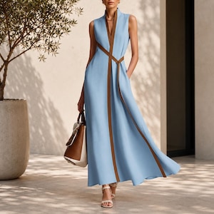 Elegante vestido largo sin mangas para mujer, vaporoso, con bolsillos, ideal para fiestas y ocasiones especiales. Diseño elegante.