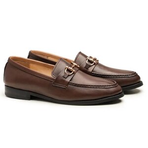 Handmade brown leather horsebit loafers for men featuring premium full-grain leather, elegant gold-tone horsebit hardware, classic moc-toe stitching, slip-on design, leather lining, and a refined style perfect for weddings, business, office, and everyday luxury wear.