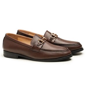 Handmade brown leather horsebit loafers for men featuring premium full-grain leather, elegant gold-tone horsebit hardware, classic moc-toe stitching, slip-on design, leather lining, and a refined style perfect for weddings, business, office, and everyday luxury wear.