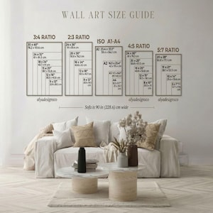 May include: A wall art size guide with dimensions in inches is displayed above a sofa. The guide includes ratios such as 3:4, 2:3, ISO A1-A4, 4:5, and 5:7, with corresponding sizes. The sofa is 90 inches wide.