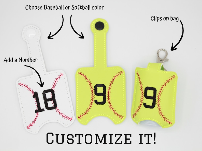 May include: Three hand sanitizer holders, one white, one yellow, and one green, with a baseball or softball design. Each holder has a number on it, 18, 9, and 9. The holders have clips to attach to a bag.  Customize It!