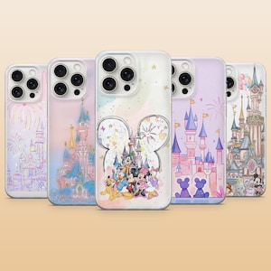 May include: A collection of five phone cases featuring colorful illustrations of Disney castles and characters. The cases have a pastel color scheme with images of fireworks, Mickey Mouse, Minnie Mouse, and other Disney characters.