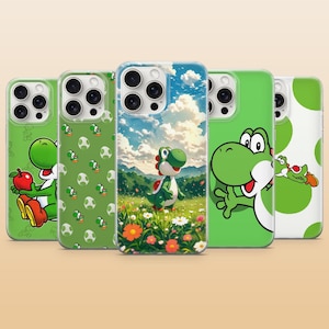 May include: A collection of five phone cases featuring the character Yoshi from the Super Mario video game series. The cases display various designs, including Yoshi holding an apple, Yoshi in a field, and Yoshi with a polka dot pattern.