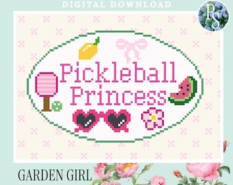 May include: A digital needlepoint stitch chart with the text "Pickleball Princess" in pink, surrounded by pixelated graphics of a lemon, bow, sunglasses, flower, and watermelon. The design is on a light pink background with a floral border and the words "Petite Stitchery" and "Garden Girl".