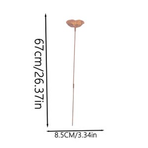 May include: A copper-colored metal garden stake featuring a flower-shaped top. The stake measures 26.37 inches in total height, with a flower diameter of 3.34 inches. The thin, straight stem supports the textured, petal-like floral head.