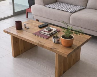 Coffee table made of solid pine wood plank in magnolia color
