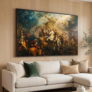 May include: Large framed artwork depicting a historical battle scene with numerous figures on horseback and foot. The painting features a dramatic sky and a dynamic composition, with a dark frame. The artwork is displayed above a beige sofa with decorative pillows.