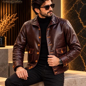 Brown men’s cowhide jacket featuring classic button styling, vintage character, defined tailoring and timeless details for versatile everyday and smart casual menswear.
#BrownJacket #MensJacket #CowhideJacket #MensFashion #VintageStyle #ClassicMenswear #MensOuterwear #MensStyle #RetroStyle #Cowhide #MensWear #VintageMenswear #ClassicJacket #MensClothing #GiftForMen #MensGift #RetroFashion #MensApparel #HeritageWear #TimelessStyle