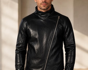 May include: A black leather jacket featuring a high collar and an asymmetrical silver-toned zipper that runs diagonally from the neckline to the bottom hem. The jacket has long sleeves and a smooth, polished finish with a structured fit.
