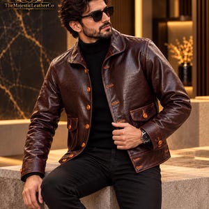 Men’s vintage cowhide outerwear with rich brown coloring, traditional button front design, structured collar and classic detailing for a distinctive timeless menswear look.
#VintageJacket #Cowhide #MensOuterwear #MensFashion #MensStyle #BrownJacket #ClassicStyle #RetroMenswear #MensWear #CowhideJacket #MensClothing #VintageStyle #ClassicJacket #MensGift #GiftForHim #MensApparel #RetroFashion #HeritageStyle #TimelessWear #MensWardrobe
