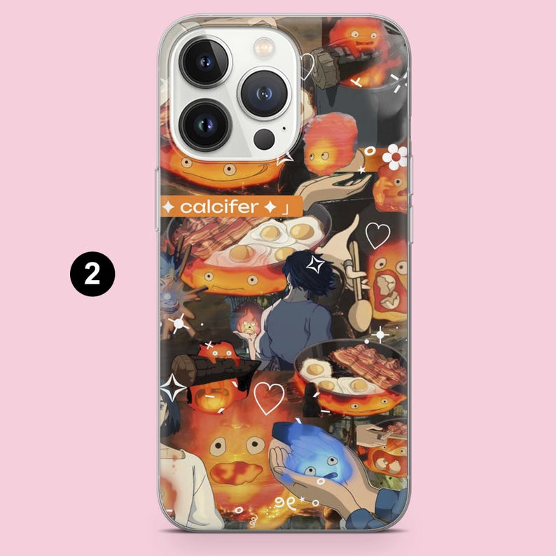 May include: A clear phone case featuring a collage of animated characters and food imagery. The design includes a fiery orange character, fried eggs, bacon, and the text "calcifer". The case has a pink background.