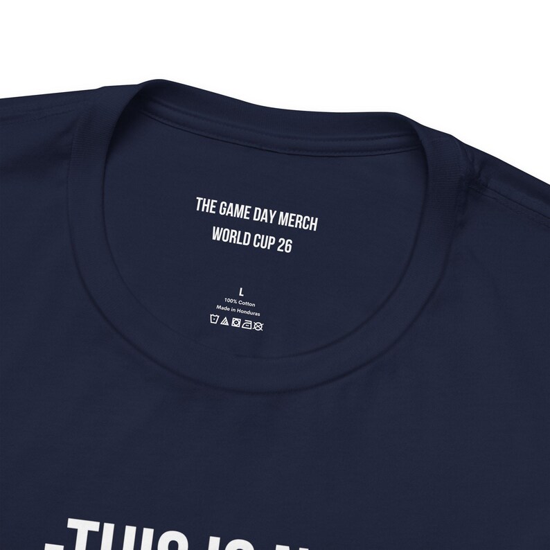 Folded navy blue USA soccer shirt with This Is Not Football It's Soccer graphic casual fan apparel