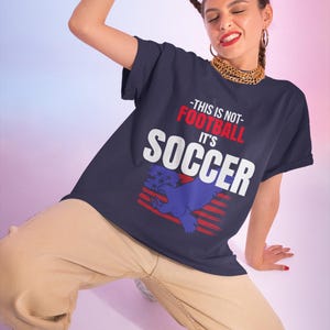 Woman wearing funny USA soccer shirt This Is Not Football It's Soccer American football fan tee