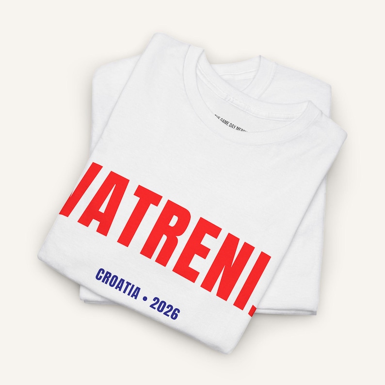 Folded white Croatia soccer shirt with Vatreni text Croatian supporter graphic tee