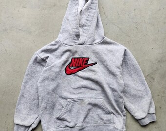 Sudadera con capucha Nike Kids 7 para jóvenes, estilo vintage Y2K.