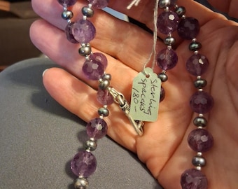Large faceted round Amethyst beads with fresh water pearls and sterling spacers. Hook pendant so length chain can be added.