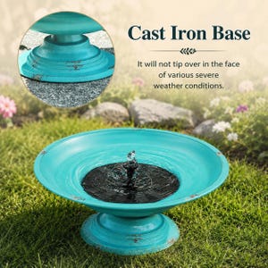May include: A turquoise bird bath with a cast iron base and a solar-powered water fountain in the centre. The text Cast Iron Base is visible, noting it will not tip over in the face of various severe weather conditions. The basin has a distressed finish.